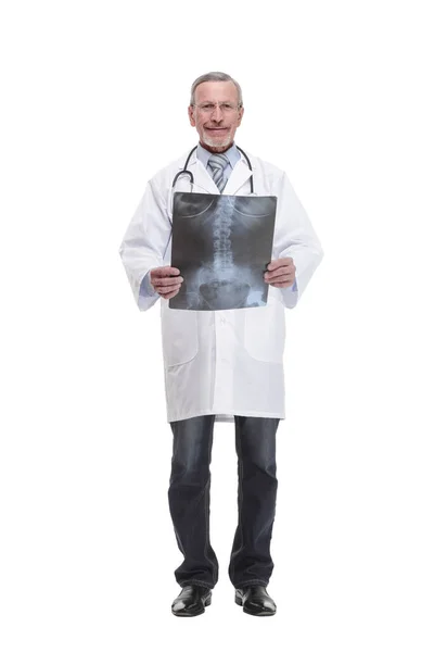 Senior doctor with stethoscope walking on white background — Stok fotoğraf