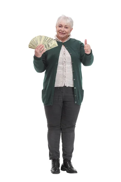 Portrait of happy aged woman holding money and pointing — Stock Photo, Image