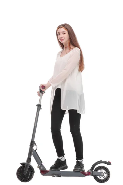 Young happy woman is standing a back near her kick scooter — Stock Photo, Image