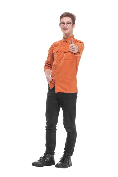 Smiling young man pointing and looking at the camera, with a hand in his pocket — Stock Photo, Image