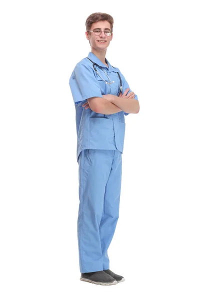 Chirurg in blauer Uniform mit Stethoskop, stehend mit verschränkten Armen — Stockfoto