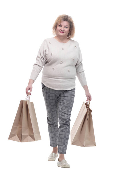 casual adult woman with shopping bags. isolated on a white