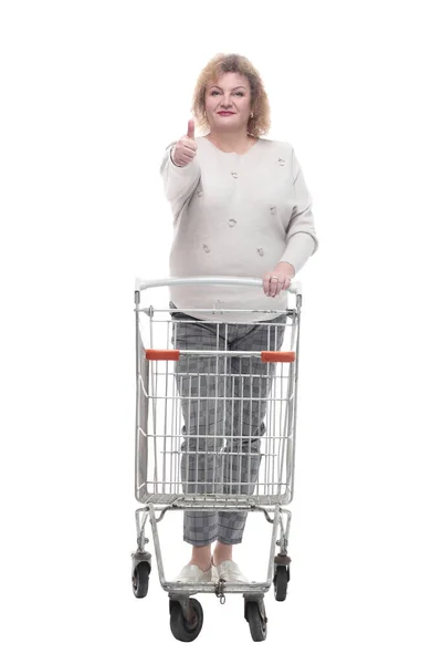 V celé délce. ležérní dospělá žena s nákupním vozíkem. — Stock fotografie