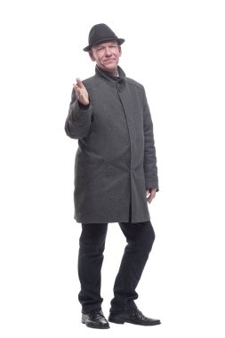 Şapkalı ve sonbahar montlu duygusal adam. .