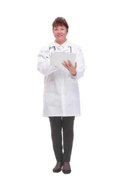 Female doctor using a digital tablet and wearing a white coat — Stock Photo, Image