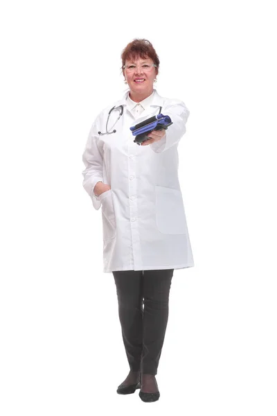 Senior female doctor holding a blood pressure cuff a hand on a white background — Stock Photo, Image