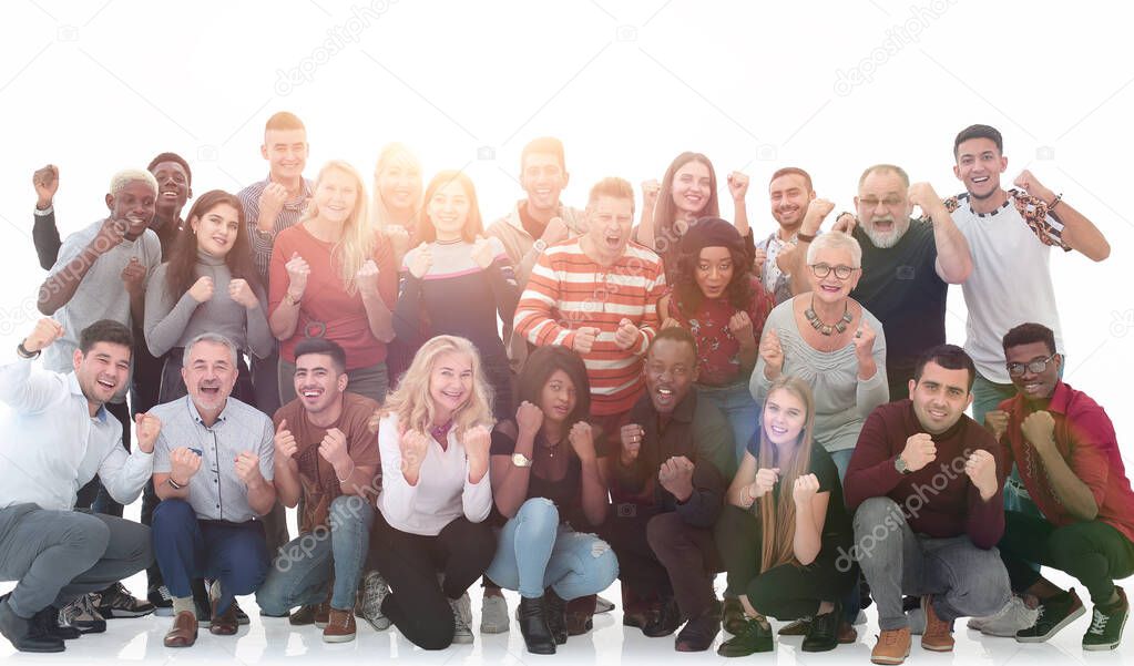 Multiethnic group of excited people with arms up isolated on whi