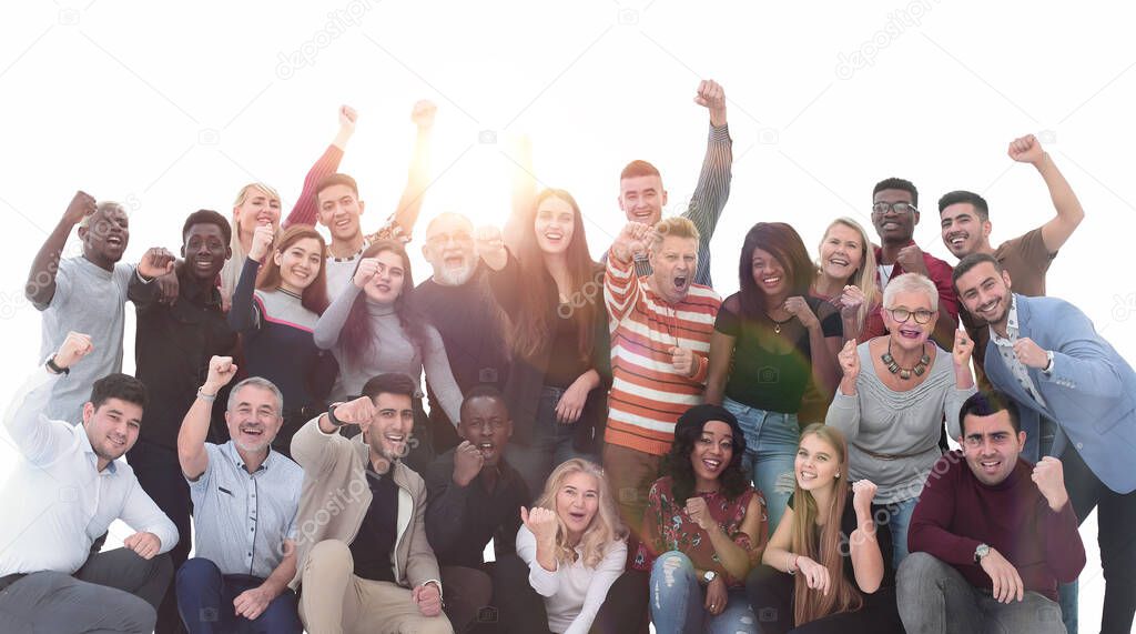 Cheerful diversity group of people with hands raised