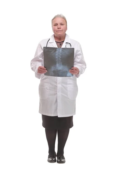 Medical doctor analysing x-ray image looking at camera and smiling — Stock Photo, Image