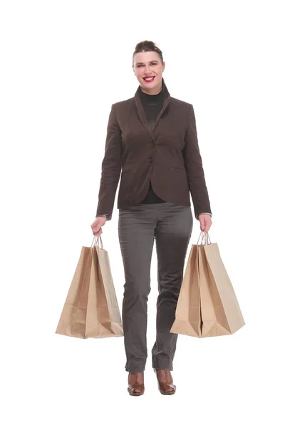 Mujer joven feliz con bolsas de compras sobre fondo blanco —  Fotos de Stock