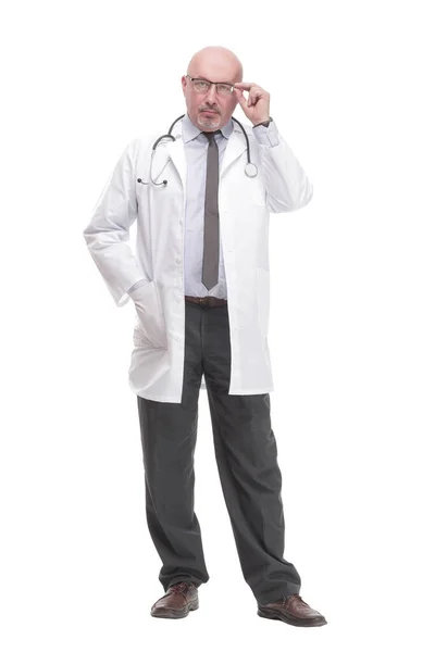 Successful mature doctor in a white coat . — Stock Photo, Image