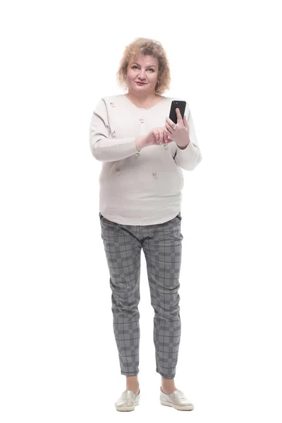 Attractive adult woman with a smartphone. isolated on a white — Stock Photo, Image