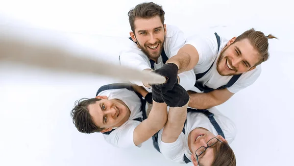 View from the top.a team of builders ,climbing up with the rope — Stock Photo, Image