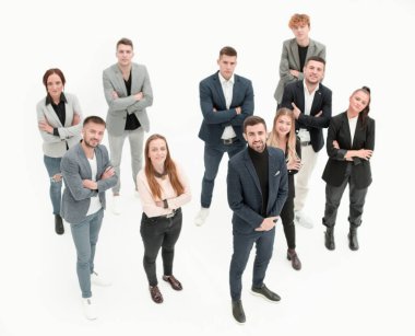 Üst Manzara. Mutlu iş ekibi yeni ofiste duruyor.