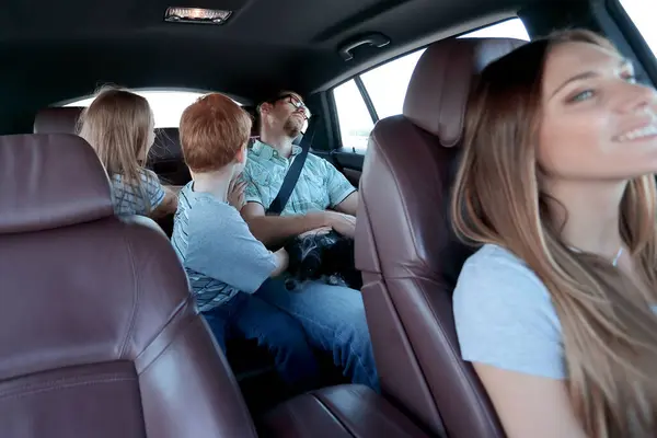 modern family making a trip in the car.family holiday concept