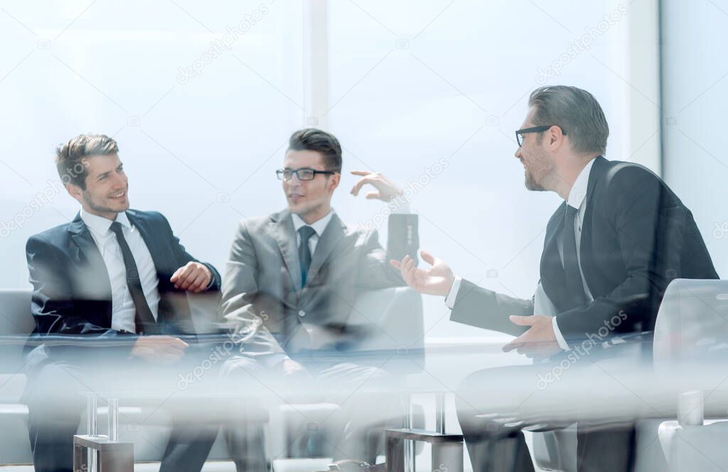 business partners discuss their ideas sitting in the conference room.photo with copy space