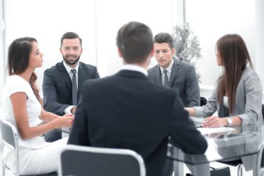 iş adamları kopya alanı ile bir ofis çalışma meeting.photo bir masada oturma grubu
