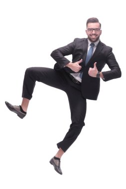 Tam gelişim. Mutlu dans eden genç iş adamı. beyaz arkaplanda izole