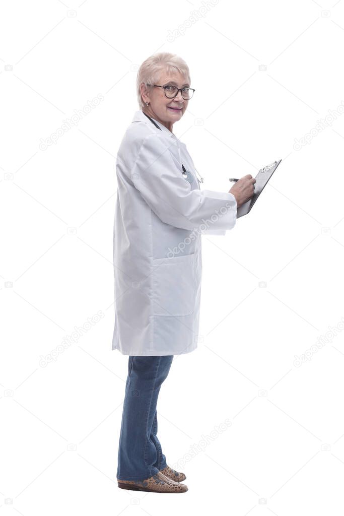 side view. female doctor writing out a prescription . isolated on a white background
