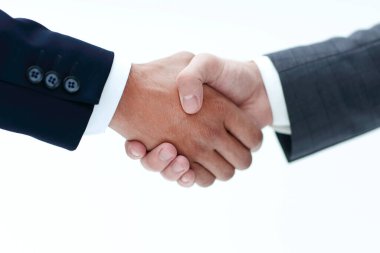 İş tokalaşması - gri bir arkaplanda anlaşma kapanıyor