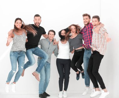 Zafer kazanan gençlerden oluşan bir grup. Işık arka planında izole edilmiş.