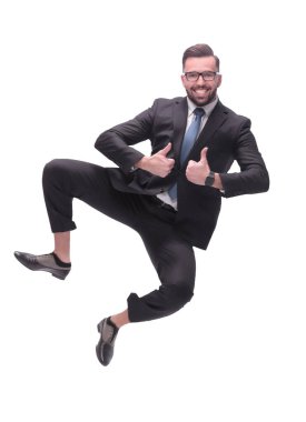 Tam gelişim. Mutlu dans eden genç iş adamı. beyaz arkaplanda izole