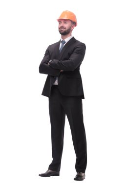 Yan görüş. Miğferli iş adamı fotokopi alanına bakıyor. beyaz arkaplanda izole