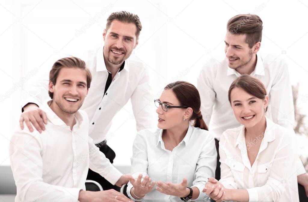 portrait of a successful business team sitting at the Desk.the concept of teamwork
