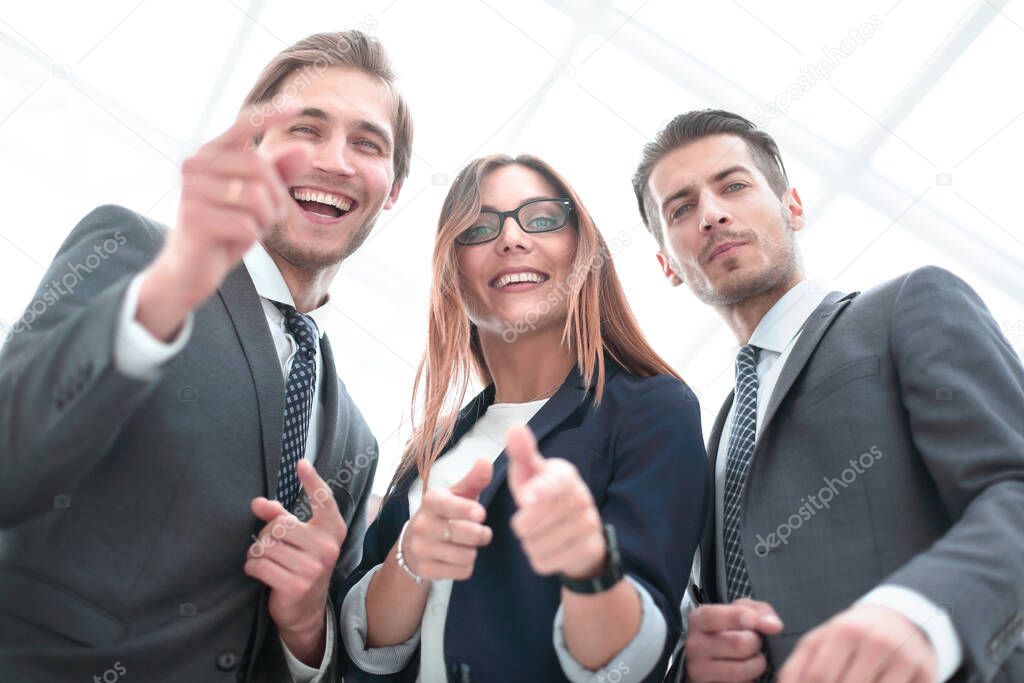 cheerful business people stand next to each other