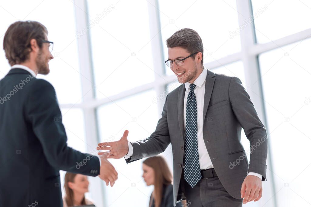 business colleagues shaking hands with each other. concept of cooperation