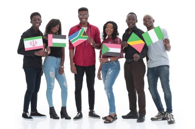 in full growth. group of diverse young people with national flags . isolated on a white background. clipart