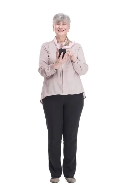 Full Growth Smiling Elderly Woman Smartphone Looking You Isolated White — Stock Photo, Image