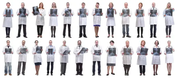 Group Doctors Holding Ray Isolated White Background — Stock Photo, Image