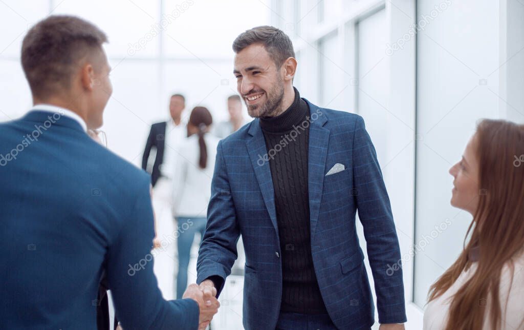 business people meeting each other with a handshake. the concept of cooperation