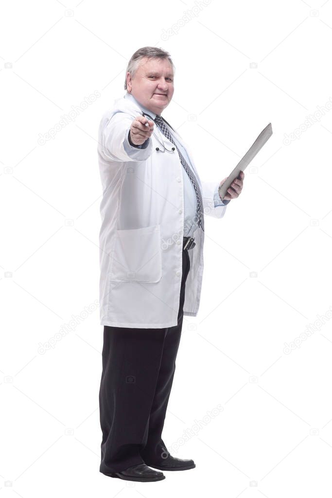 in full growth.competent doctor with clipboard. isolated on a white background.