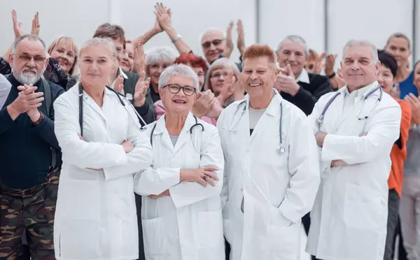 Happy Doctors Standing Corridor Team Hospital Crossed Arms — Stock Photo, Image