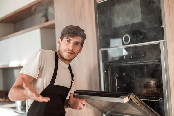 Close Frustrated Young Man Standing Broken Oven — Stock Photo, Image