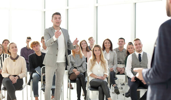 close up. speaker answering questions during the seminar. photo with copy space