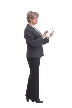 Smiling business woman in black suit with tablet computer. Isolated over white background
