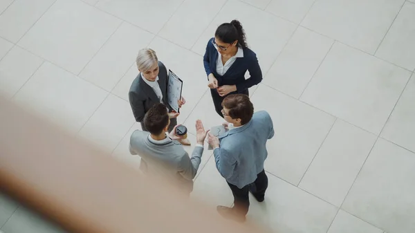 Top View Group Business People Suits Discussing Financial Graphs Lobby — Stock Photo, Image