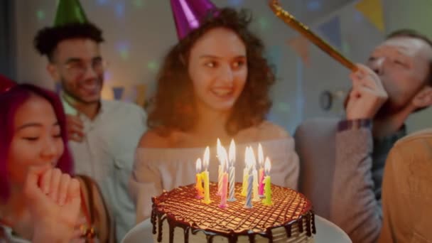 Close Delicious Birthday Cake Young Woman Party Hat Blowing Candles — Stock Video