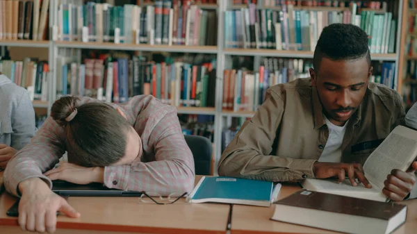 Diligent Students Preparing Exams Doing Homework Tired Guy Sleeping Table — Stock Photo, Image