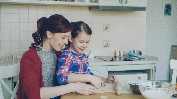 Smiling Mother Cute Daughter Making Christmas Cookies Together Sitting Modern — Stock Photo, Image