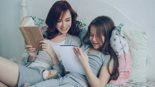 Careful Mother Helping Her Little Cute Daughter Homework Elementary School — Stock Photo, Image