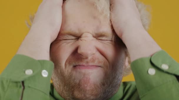 Close Portrait Irritated Young Man Pulling Hair Looking Camera Expressing — Stock Video