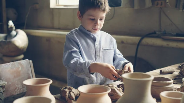 Curious Little Boy Playing Clay Working Table Potters Workshop Kneading — Stock Photo, Image