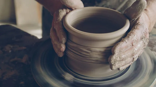 Senior Male Ceramist Concentrated Making Pot Clay Spinning Throwing Wheel Stock Image