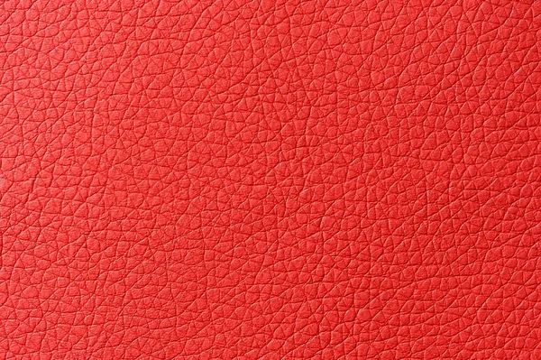 Textura de fundo de couro artificial vermelho brilhante — Fotografia de Stock