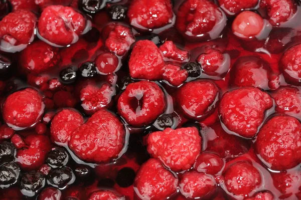 Berries (Raspberries and Currants) in Jelly Stock Photo