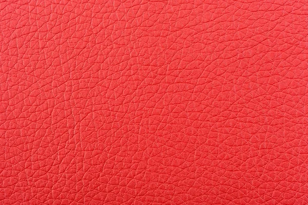 Красный искусственный кожаный фон текстуры — стоковое фото